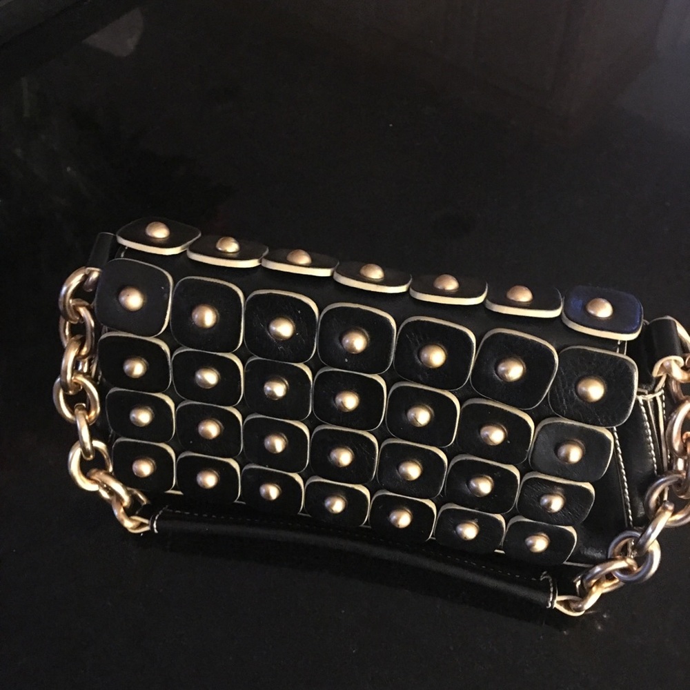 Black pocketbook with gold chain. TURN HEADS!